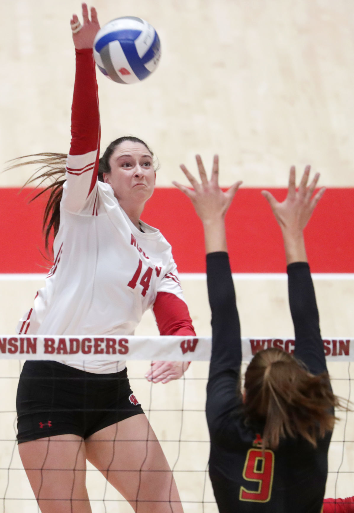 Wisconsin competes against Maryland in a women's volleyball match at the UW Field House